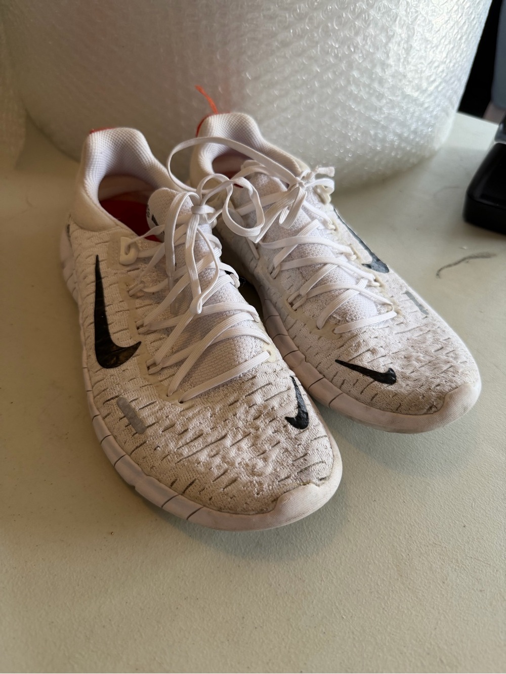 Nike Women’s Size 7 White Sneakers with Black Swoosh camo stripe Nike Free